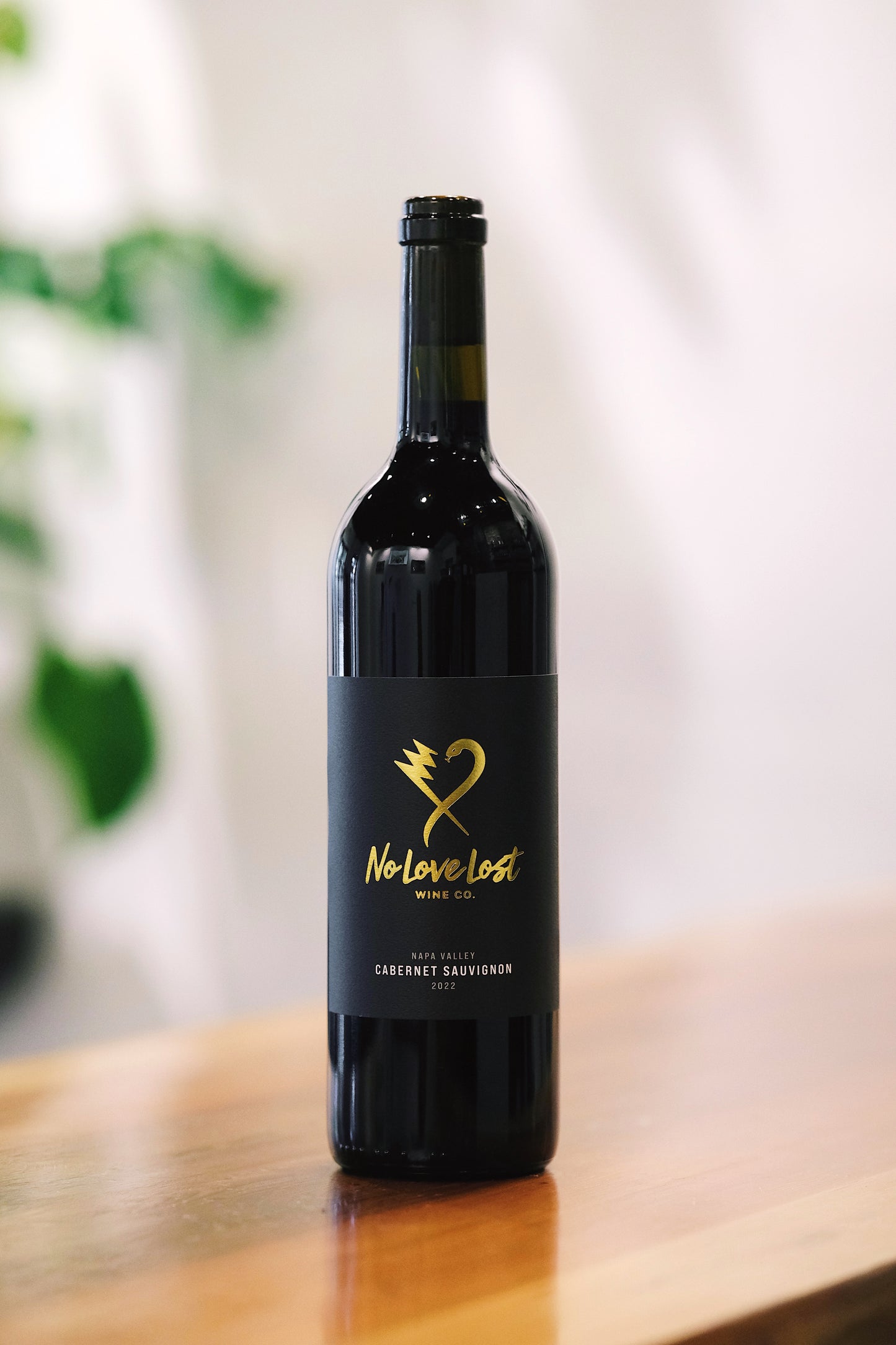 2023 No Love Lost Cabernet Sauvignon — 100% Cabernet from organically farmed vineyards in Coombsville, Silverado Bench, and Oak Knoll District, Napa Valley. Rich black fruit, blackberry, black currant, and blueberry flavors. Full-bodied with velvety texture, balanced acidity, integrated tannins, aged 22 months in new Bordelaise French oak. 14.2% ABV."
