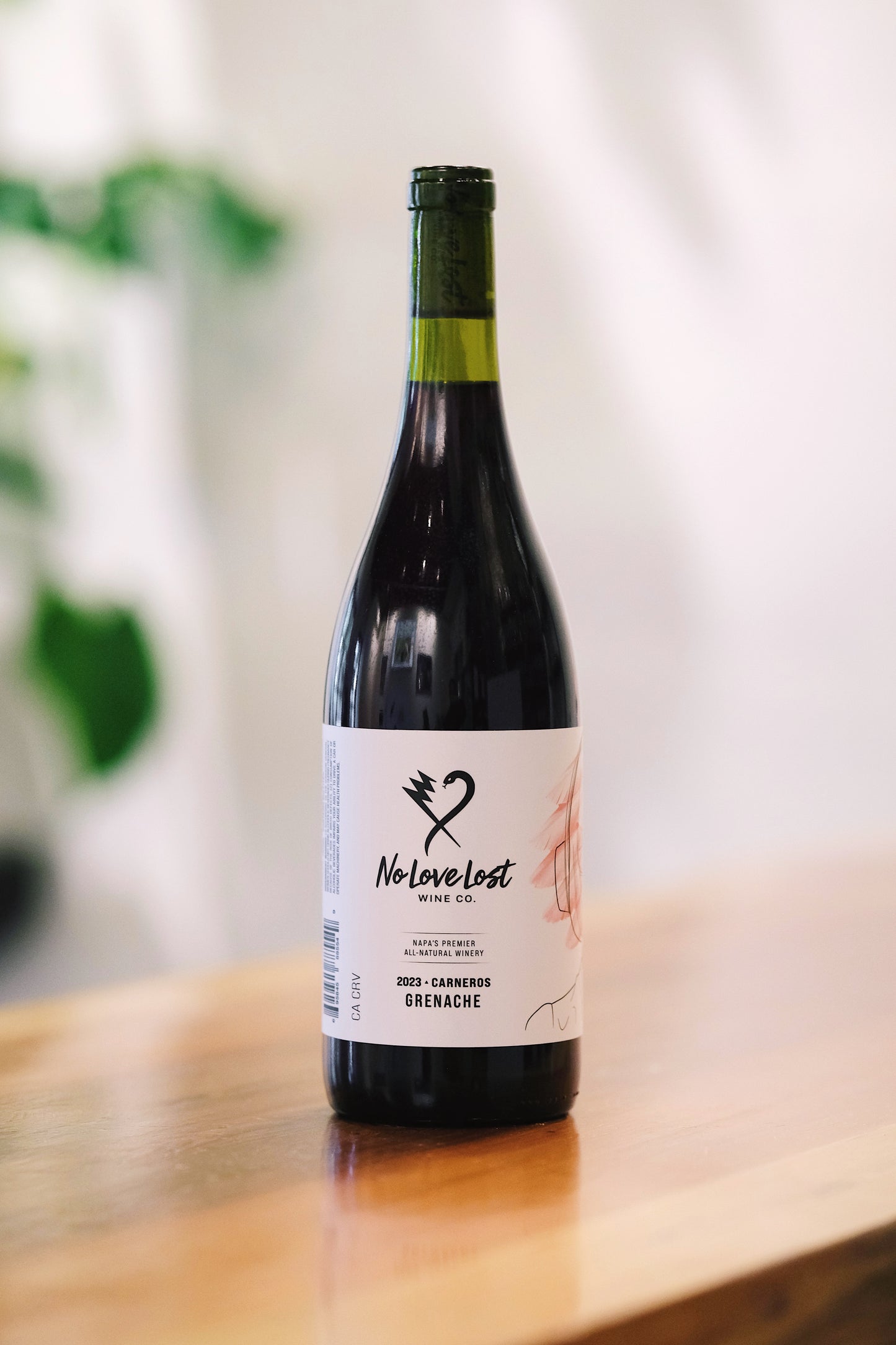2023 No Love Lost Sonoma Grenache — Carneros vineyard, medium-bodied red with aromas of ripe strawberry, raspberry, spice, and pepper. Flavors of red cherry, pomegranate, and subtle herbs with soft tannins and a long finish. Perfect with roasted meats, grilled vegetables, or cheese. 12.4% ABV.