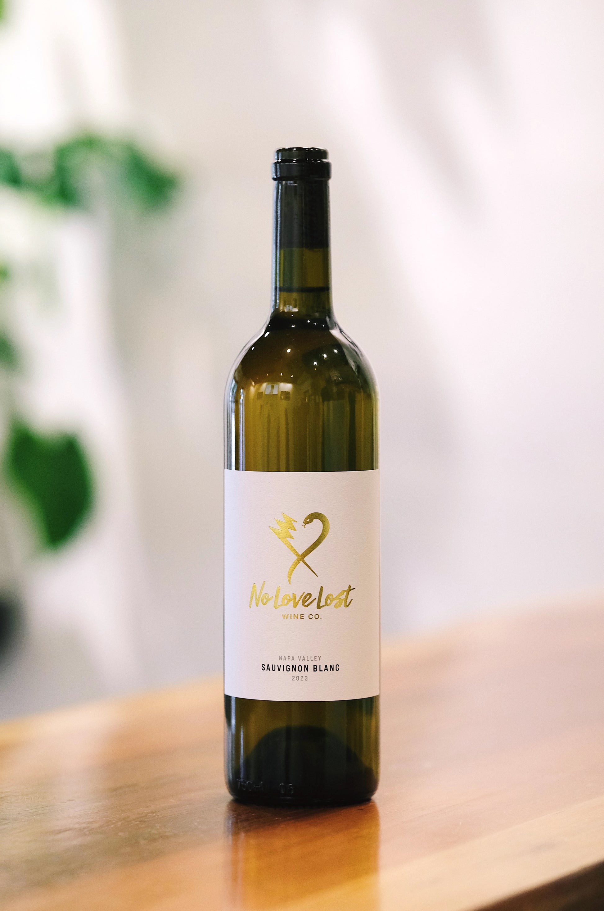 Bottle of No Love Lost 2023 Napa Valley Sauvignon Blanc natural wine, offering bright citrus and tropical fruit flavors with crisp acidity, crafted with minimal intervention for natural wine lovers.