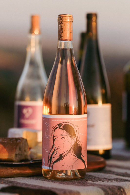 2023 No Love Lost Rosé — organic family-owned vineyard on east Lodi, sustainably farmed and CCOF certified. Grenache clones Entav & Davis, lightly foot-treaded, tank fermented, aged 6 months in neutral Loire oak. Aromas of watermelon rind, strawberry, and stone fruit; ripe peach palate with bright, long-lasting acidity. 12.1% ABV.