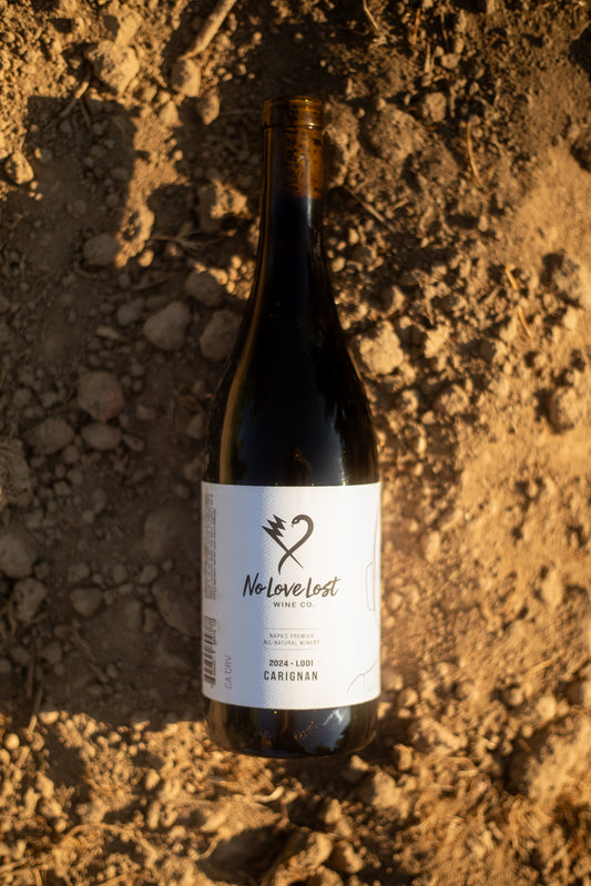 2024 No Love Lost Carignan — old-vine wine from a historic 1906 vineyard in west Lodi. Fresh dark fruit with savory bay leaf and sage, crafted with carbonic maceration and aged in neutral French oak. Earthy yet lively, drink now or cellar up to 15 years. 12.1% ABV.